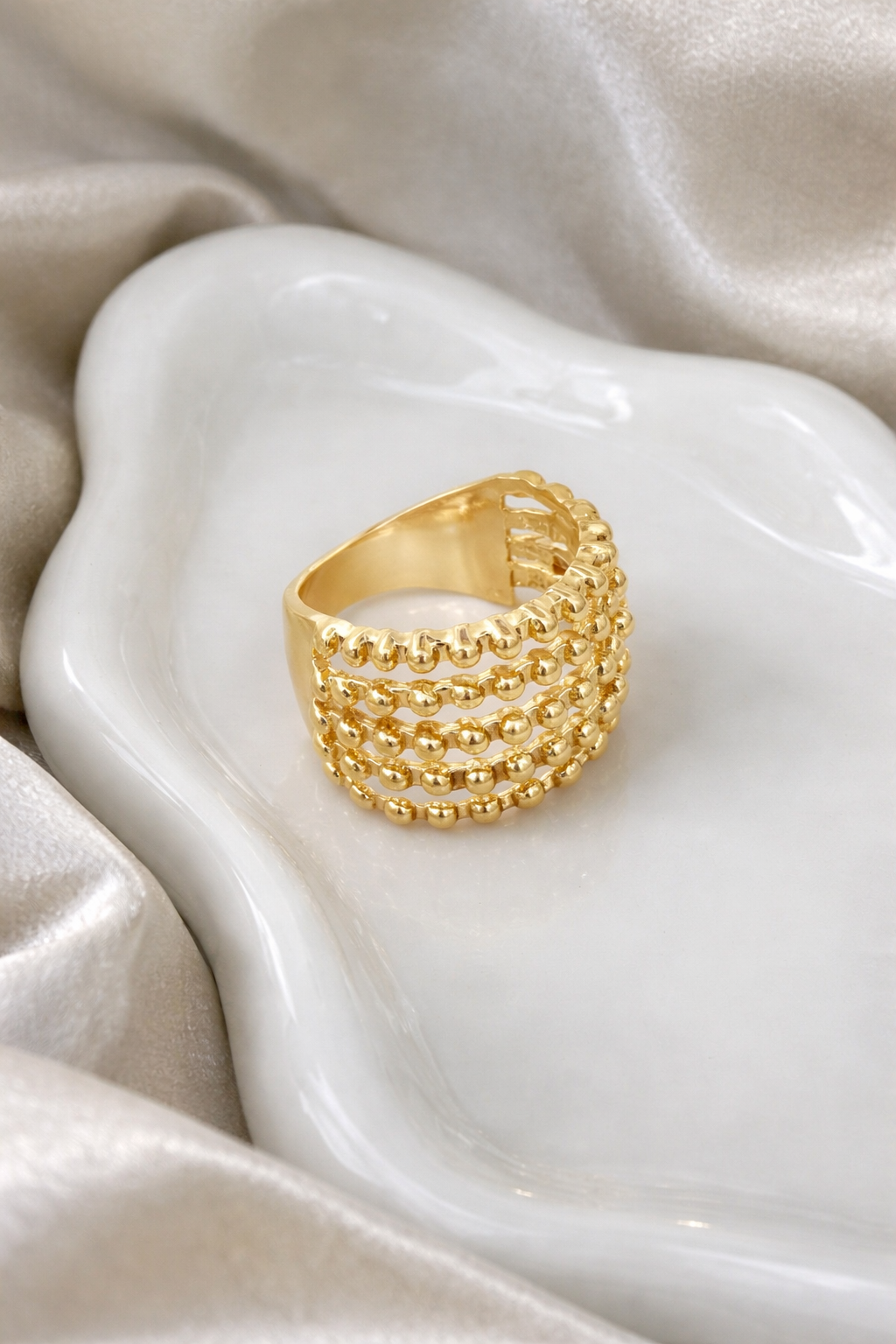 Stacked beaded gold ring with polished finish, chic minimalist women’s ring”
